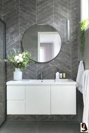 If you're trying to fit a bathroom or powder room into a (really really) tight space, take a look at this list of sinks and vanities that can squeeze into the with traditional wall mounted basins, you get all the sink without a bulky vanity swallowing up space. Chevron Concrete Ensuite Floors Marble Modern Tiles A Modern Ensuite With Marble Look Chevr Marble Bathroom Floor Chevron Tile Bathroom Interior Design
