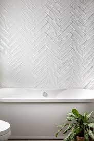 White Herringbone Tile Bathroom