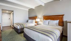 An indoor pool at beautiful oceanfront 2 bedroom luxury suite at oceanaire resort, upscale resort. Reserve Hotel Suites At The Country Inn Virginia Beach Oceanfront Va