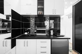 A touch of white always makes a kitchen look larger. 31 Black Kitchen Ideas For The Bold Modern Home