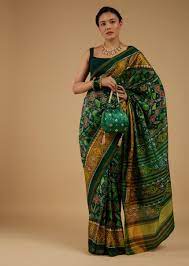 deep green saree in silk with ikat