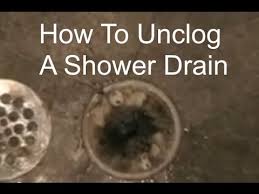 unclog and clean your shower drain