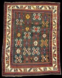 antique kazak rugs with ram s horn motif