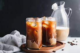 pitcher of iced coffee lattes ready to