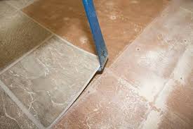 how to remove l and stick floor tile