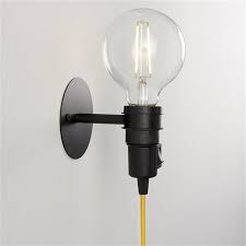 studio matt black plug in wall light