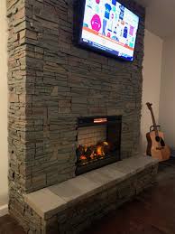 Tv Above The Fireplace Design Ideas