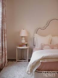 pale pink grown up bedroom with garden
