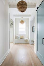 coastal light wood floor hallway ideas