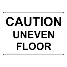 caution uneven floor