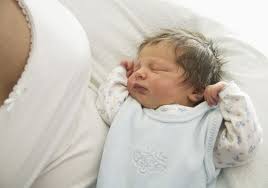 The day a baby is born, so is a parent. Tips For Breastfeeding A Sleeping Baby