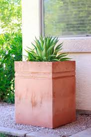 The sturdy flower pots are inexpensive and will last for many years. Remodelaholic How To Make A Tall Concrete Planter