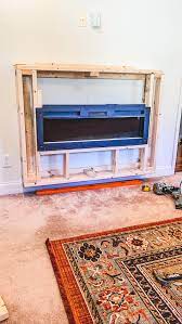 bedroom electric fireplace with shiplap