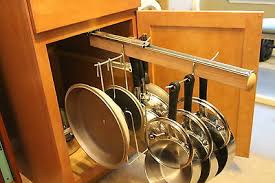 Also, kitchen racks add a dynamic range of color to your kitchen, from the dark reds of powdered paprika to the bright yellow of an aromatic curry blend. Pull Out Under Cabinet Hanging Pot And Pan Lid Rack Cookware Organizer Ebay