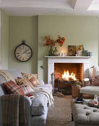 Fireplaces are used at the present time mostly for the relaxing ambiance they. Compact Country Living Room With Open Fire The Room Edit Country Style Living Room Cosy Living Room Country Living Room
