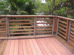 Years after installation, they'll look exactly as they did when they were new. Horizontal Slats Look Nice If Only We Had Tropical Trees Around Us Deck Railings Deck Decks Backyard