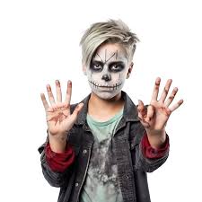boy with halloween make up shows