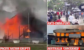 Anti-China riots erupt in the Solomon Islands as Australia sends in TROOPS  | Daily Mail Online