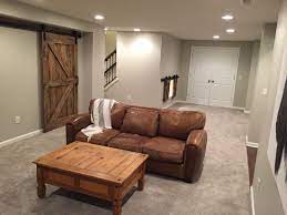Rustic retreat in a home designed with lakeside views and rustic cottage influences navy bathroom decorating ideas. Finished Basement Walls Are Agreeable Gray By Sherwin Williams Brown Living Room Brown Living Room Decor Living Room Decor Gray