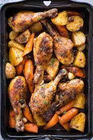baked en legs and vegetables the
