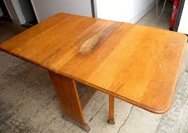 damaged oak table with beeswax polish