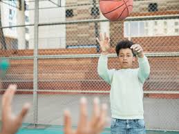 young children to p a basketball