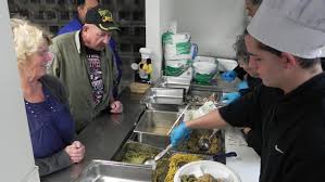 volunteer at a soup kitchen