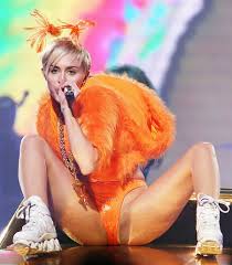 Miley Reveals Nipples And Almost Vagina In Hot Orange Bangerz.