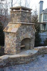 Outdoor Stacked Stone Fireplace With