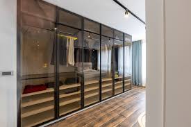 17 Glass Wardrobe Designs For An