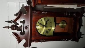 Wooden Pendulum Wall Clock Rs 6500