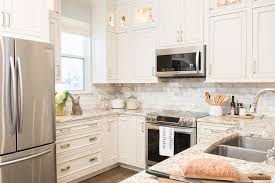 white kitchen cabinets with gold and