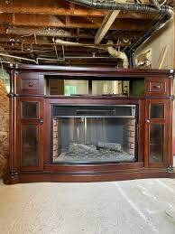 magikflame fireplace with a cabinet
