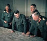 German General von Manstein meets Hitler for dinner, to propose ambitious new plans for the Western invasion: rather than fighting French & British troops in Belgium, encircle & trap them against Channel