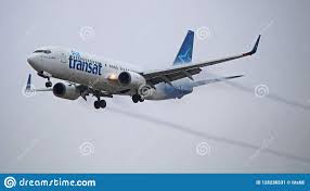 Air Transat Boeing 737 800 With Contrails On Final Approach
