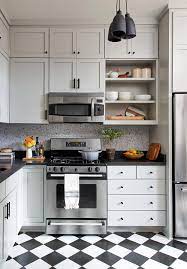 Question how much clearance above a stovetop range is required when installing kitchen cabinets and a microwave? How To Install An Over The Range Microwave To Maximize Kitchen Space Better Homes Gardens