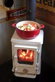 from wood stove to cook pot