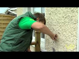 Paint An Exterior Pebbledashed Wall