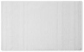 hand crafted bath mat in bright white