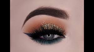 teal and gold l nightime glam makeup