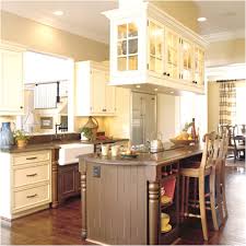 Old kitchen cabinets can have elaborate details and soft colors, which enhance the vintage charm. Cream Cabinets With White Trim Roomology