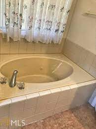 whirlpool tub without removing