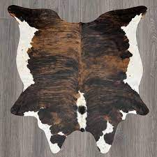 dark brown tricolor brindle cowhide rug