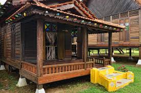 Image via desa balqis beach resort (facebook). Desa Balqis Features Traditional Malay Houses By The Beach