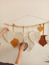 Learn how to create a macrame wall hanging with these easy steps! Large Macrame Feathers Macrame Leaves Boho Leaves Etsy In 2021 Macrame Patterns Macrame Patterns Tutorials Yarn Hanging