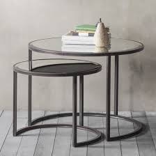 Perfect to tuck together when more space is needed for entertaining, or fit for generous living spaces, the elle flat metal nest coffee tables is a set of two versatile pieces that can be used together or on their own. Mirror Topped Industrial Round Nesting Tables Primrose Plum
