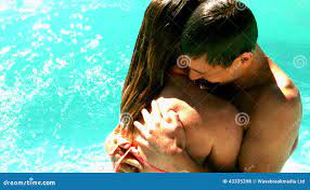 Couple Messing about in the Pool Together on Holidays Stock Footage - Video  of sunlight, people: 43335398