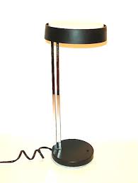 The durable, steel black shade blends with any design style. Vintage Modern Lightolier Desk Lamp Nvision Cincinnati Handmade Vintage Clothing Art Furniture