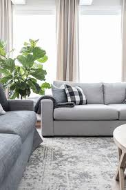 white sofa gray rug white couch gray