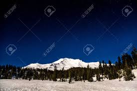 Mount Shasta From Bunny Flat Trailhead Viewed By Full Moon Light Late At  Night With Stars Overhead In A Clear Dark Sky. Stock Photo, Picture and  Royalty Free Image. Image 123610079.